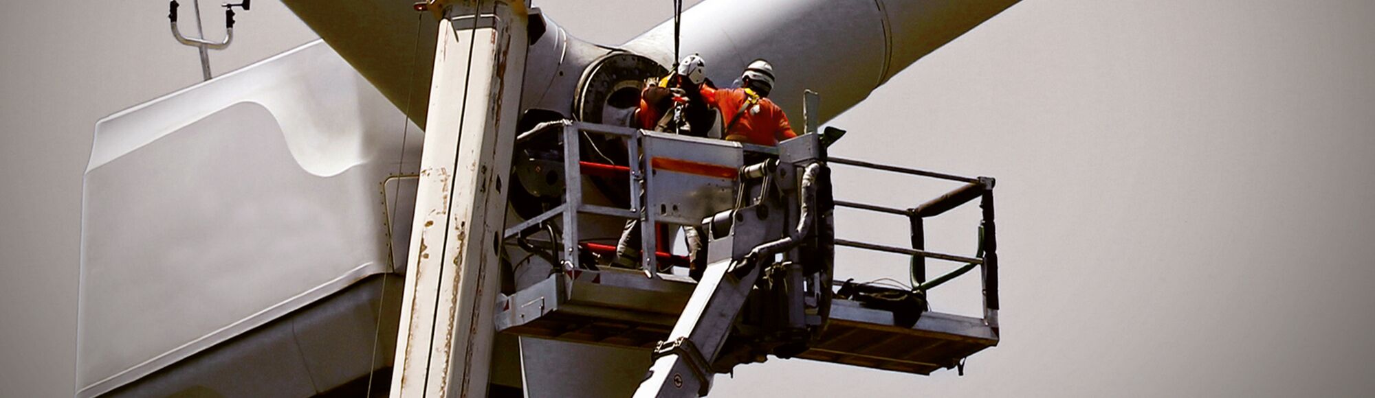 Technicians repairing wind turbine using FACOM tools