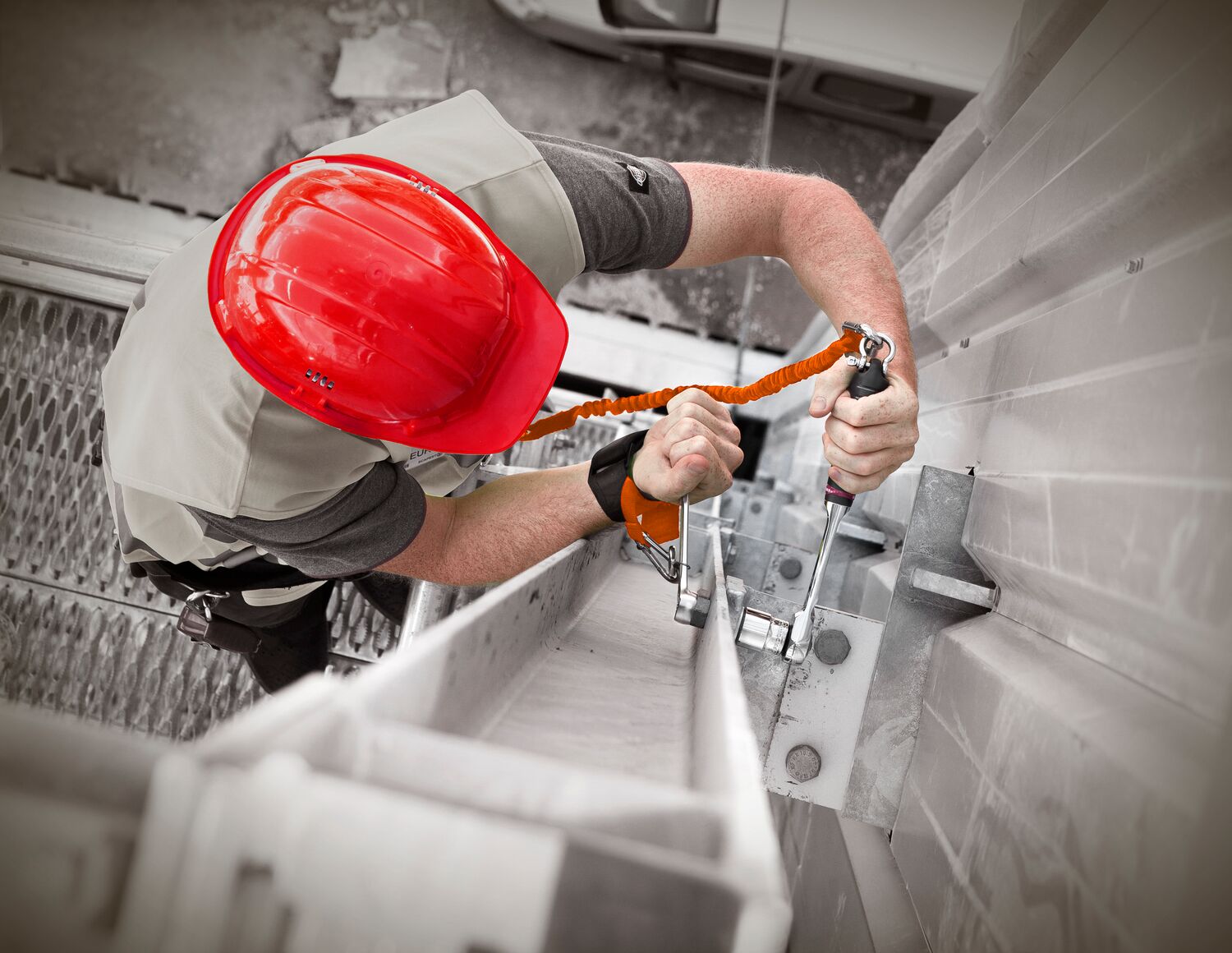 Technician working at height with FACOM tools