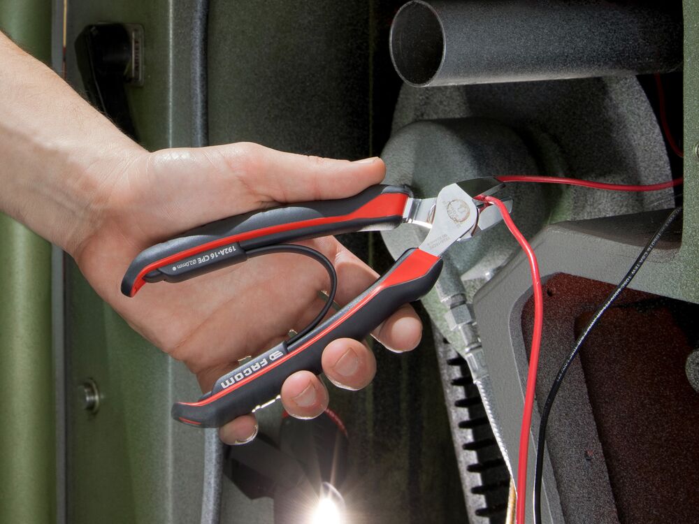 Pair of FACOM pliers cutting electrical wires